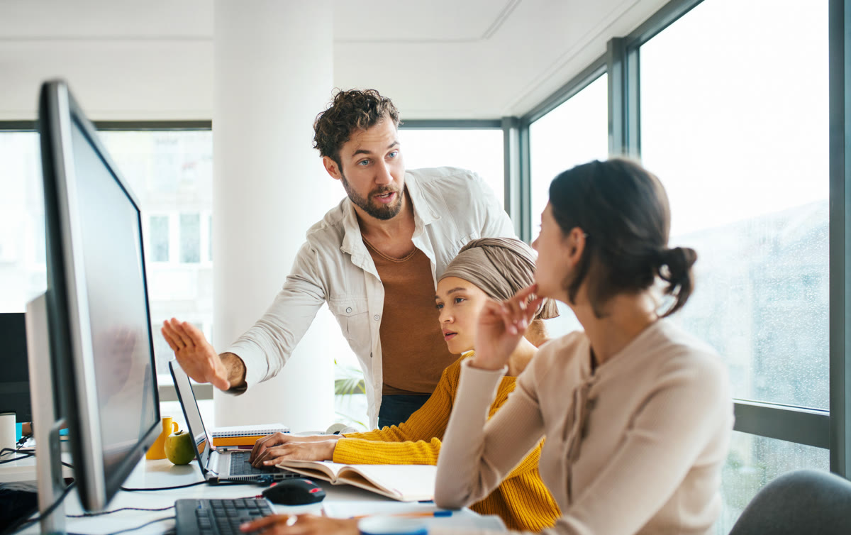 Team working on computer tasks